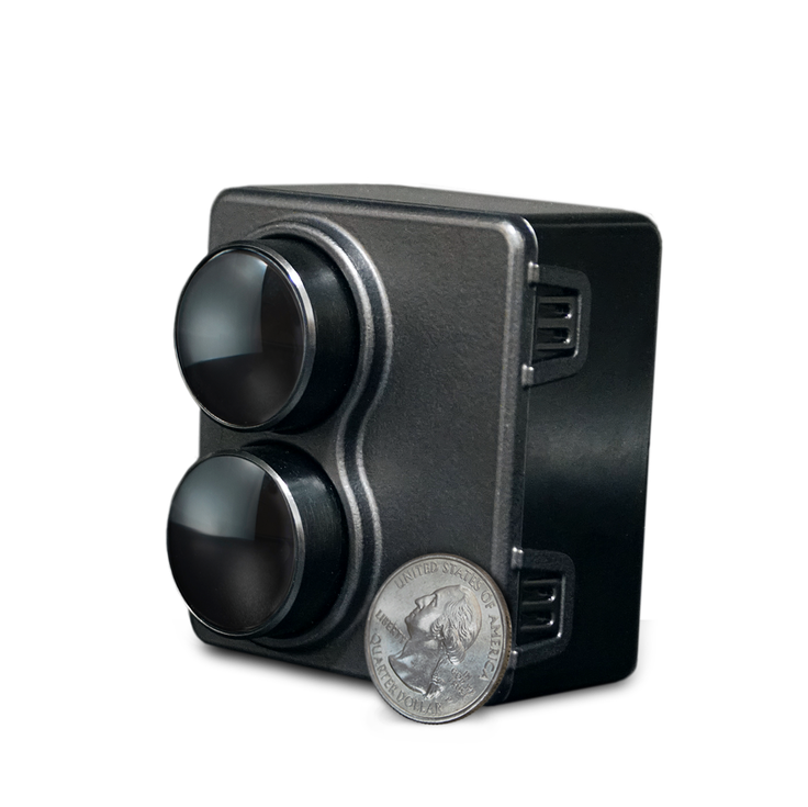 MOVIA S - Size compared to a coin